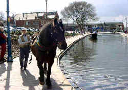 Following the canal through Armentieres Square.